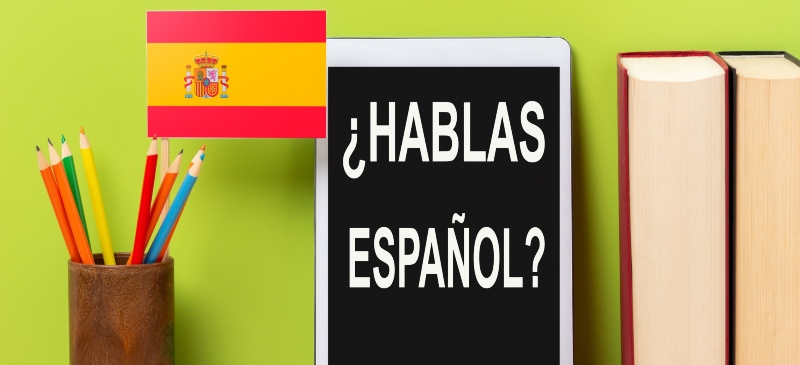 hablar español